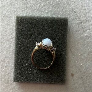 Elegant Gold and White Stone Ring